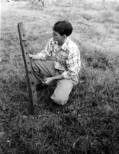 Raymond Taunton holds a ship's rib recovered from Goodin's Creek - Walton County, Florida