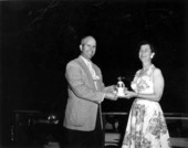 Mrs. Winifred Smith receiving an award on behalf of her son