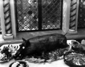 Stuffed roasted young pig with other dishes of food in the Columbia Restaurant - Ybor City, Florida