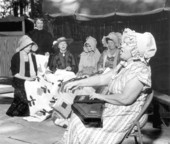Mount Pleasant Home Demonstration Club members knitting quilts at the Florida Folk Festival