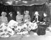 Mount Pleasant Home Demonstration Club members knitting quilts at the Florida Folk Festival