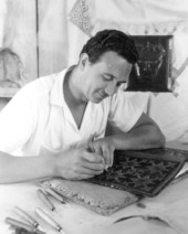 Leather decorator at work at the Quadricentennial Festival - Pensacola, Florida
