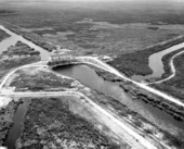 Aerial view of canal and pumping station in flood control district : Everglades, Florida
