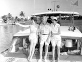 Lynn Genaria and Mr. and Mrs. T. Warren Smith aboard a yacht - Fort Lauderdale, Florida