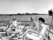 Lynn Genaria and Mr. and Mrs. T. Warren Smith aboard a yacht - Fort Lauderdale, Florida