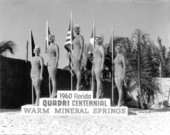 Young women in swimsuits holding flags at the 1960 Florida Quadricentennial Festival - Warm Mineral Springs, Florida