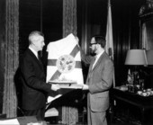 Governor LeRoy Collins presenting official state flag in exchange for memorial model - Tallahassee, Florida.