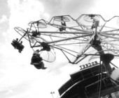 People enjoying an amusement ride at the North Florida Fair - Tallahassee, Florida