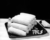 A tray of corn-on-the-cob on the table - Tallahassee, Florida