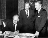 Governor Farris Bryant autographing the first "See Florida this Summer" poster - Tallahassee, Florida.