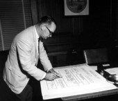Florida State Senator and Director of Conservation Randolph Hodges working on an organizational chart of the Florida State Board of Conservation