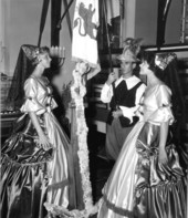 Young women and man in Spanish costume at the museum during the Fiesta of Five Flags - Pensacola, Florida.