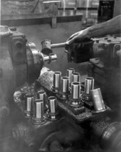 A worker making some metalwork in the Perkins plant - North Miami, Florida.