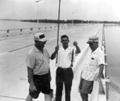 A man showing off his catch of fish at Deer Point Lake - Panama City, Florida.