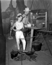 Deane Martin with mannequin at the back of a chuck wagon- Silver Springs, Florida.