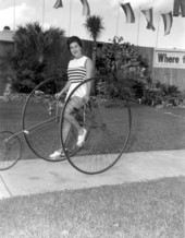Deane Martin riding large antique tricycle- Silver Springs, Florida.