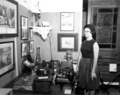 Miss Jean Hill standing in an exhibit room at the Pinellas County Historical Museum - Clearwater, Florida