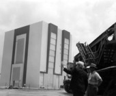 Unidentified men view the vehicle assembly building - Cape Canaveral, Florida