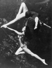 Unidentified women performing graceful underwater acrobatic ballet at Weeki Wachee Springs near Brooksville.