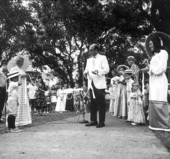 Man cutting ribbon at dedication in Seville Square - Pensacola, Florida.