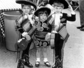 Three children in Spanish costumes at Ybor City - Tampa, Florida.