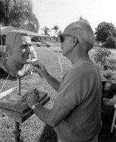 Sculptor John Worthington working on a bust