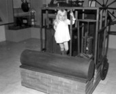 A little girl standing on the ice machine at the John Gorrie Museum - Apalachicola, Florida.