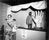Family enjoying the Mystery Fun House - Orlando, Florida.