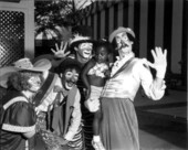 Clowns holding a young girl- Orlando, Florida