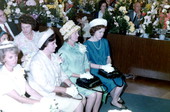 Mrs. Haydon Burns and Mrs. E.C. Rowell with daughters sit at the opening day ceremony of the legislative joint session - Tallahassee, Florida.