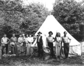 Posing outside a tent