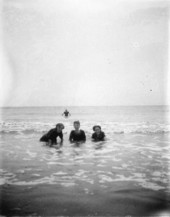 Four figures in surf