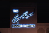 The Burt Reynolds Dinner Theatre sign in Jupiter, Florida at night.