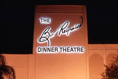 Nighttime view of the Burt Reynolds Dinner Theatre sign in Jupiter, Florida.