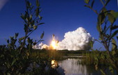 View showing space shuttle launch at the Kennedy Space Center.