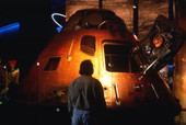 Visitor viewing space capsule at the United States Astronaut Hall of Fame attraction in Titusville, Florida.