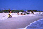 View showing people at the Canaveral National Seashore beach in Brevard County near Titusville, Florida.