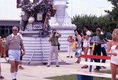 View showing visitors in the Kennedy Space Center rocket garden on Merritt Island near Titusville, Florida.