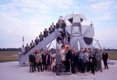 Visitors gathered for group portrait by the lunar module on display in the Kennedy Space Center rocket garden.