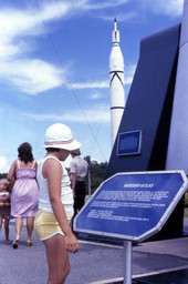 Visitor reading about the Mercury-Atlas rocket in the Kennedy Space Center rocket garden on Merritt Island near Titusville, Florida.