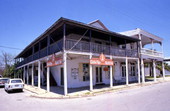 View of historic buildings on the north side of 2nd St. at the corner of C St. in Cedar Key, Florida.