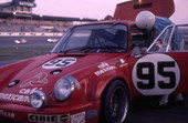 Porsche car 95 in the 24 Hours of Daytona race at the Daytona International Speedway racetrack.