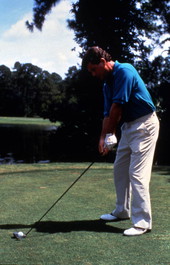 Golfer preparing to tee off at Daytona Beach, Florida.