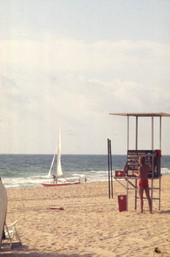 Lifeguard next to his stand at Ft. Lauderdale Beach, Florida.