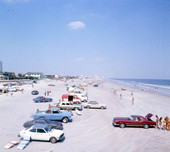 Bird's eye view of people and cars at the beach - Jacksonville, Florida