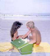 Couple and their cooler at the beach - Jacksonville, Florida