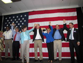Florida Democratic Party candidates standing together during a rally in Tampa, Florida.