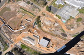 Aerial view looking north over construction at Centennial Field at Cascades Park in Tallahassee, Florida.