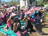 Sabal Palm Elementary School children waving pennants during unveiling of historical marker for FSU's West Campus in Tallahassee, Florida.