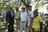 Reverend Henry Steele posing with group during the Emancipation Day Celebration at the Knott House Museum in Tallahassee.
